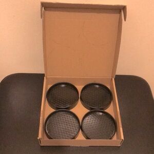 4 piece Non Slip Black Textured Furniture Coasters Set. Scratch free floors